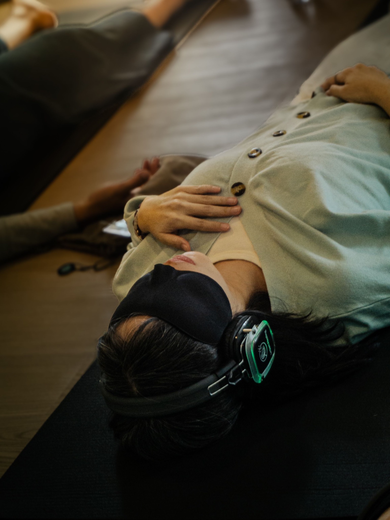 Participant resting during a guided breathwork session